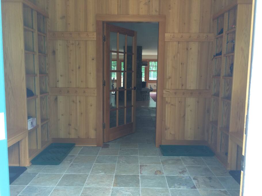 Mud room with warm radiant heated floor and plenty of benches and cubbies for all your ski gear!