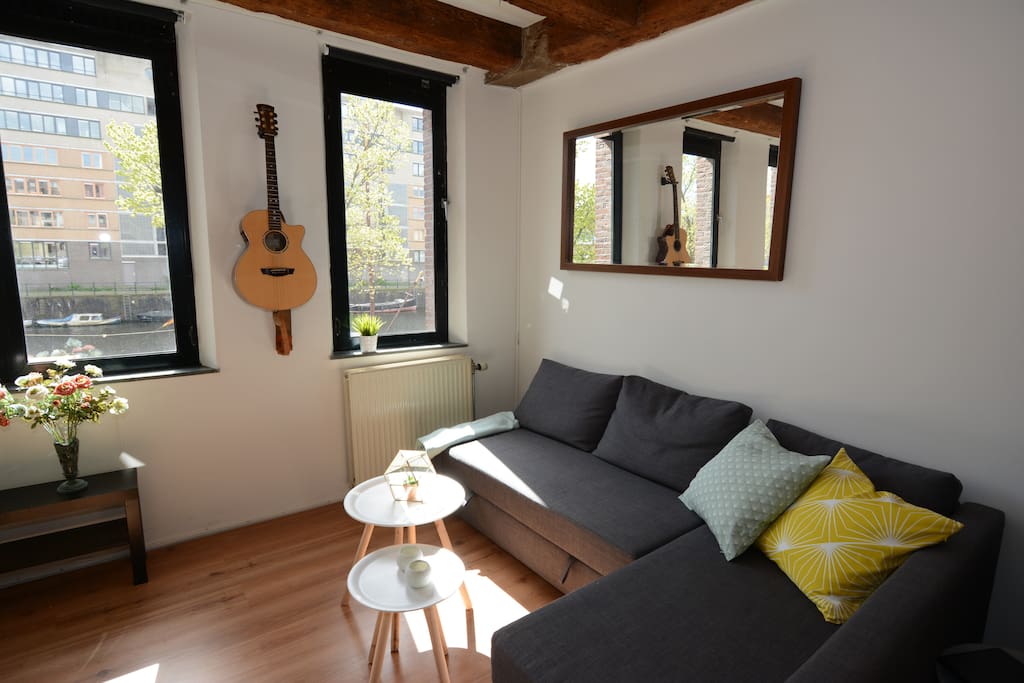 Living area great amount of sunlight and with views on the canal.