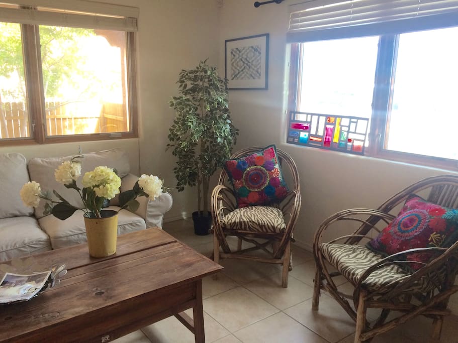 Comfy, bright, open living space to mingle and watch movies.