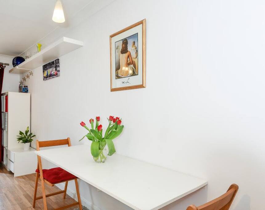 Table is ideal for eating and working on. Seats up to four.