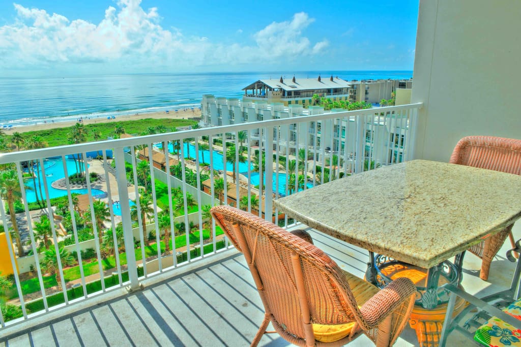 Beach View from private balcony with granite table and chairs