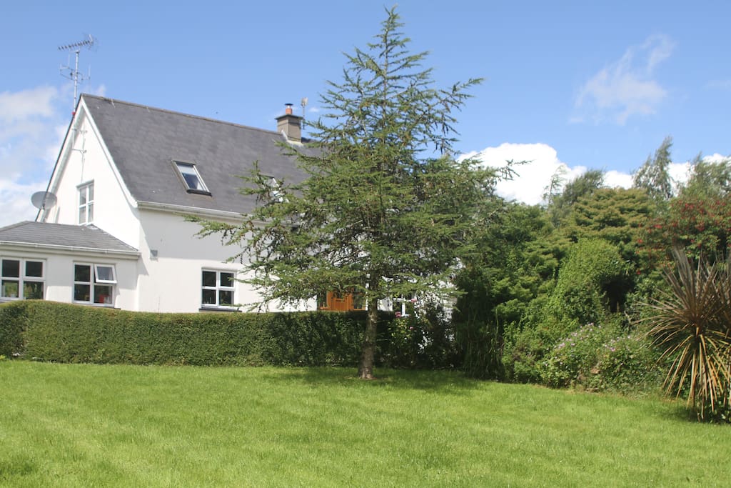 Garden with view of house