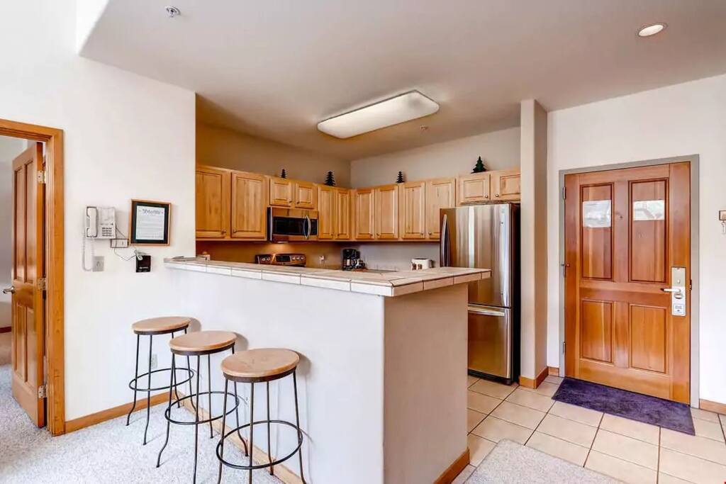 Take a seat at the breakfast bar.