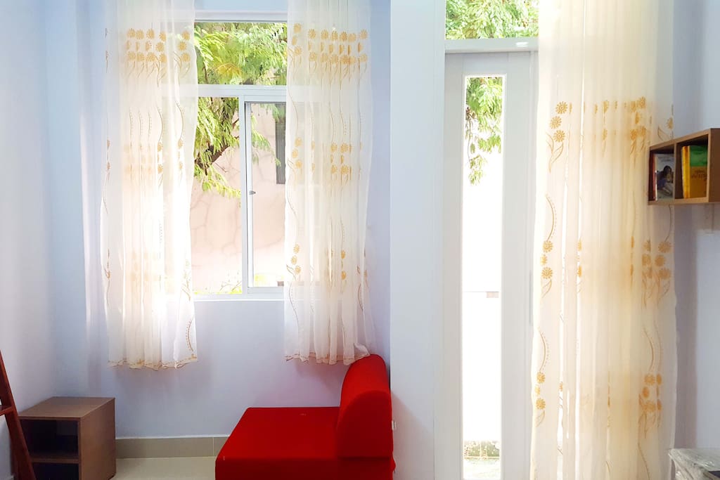 Big window & balcony in room