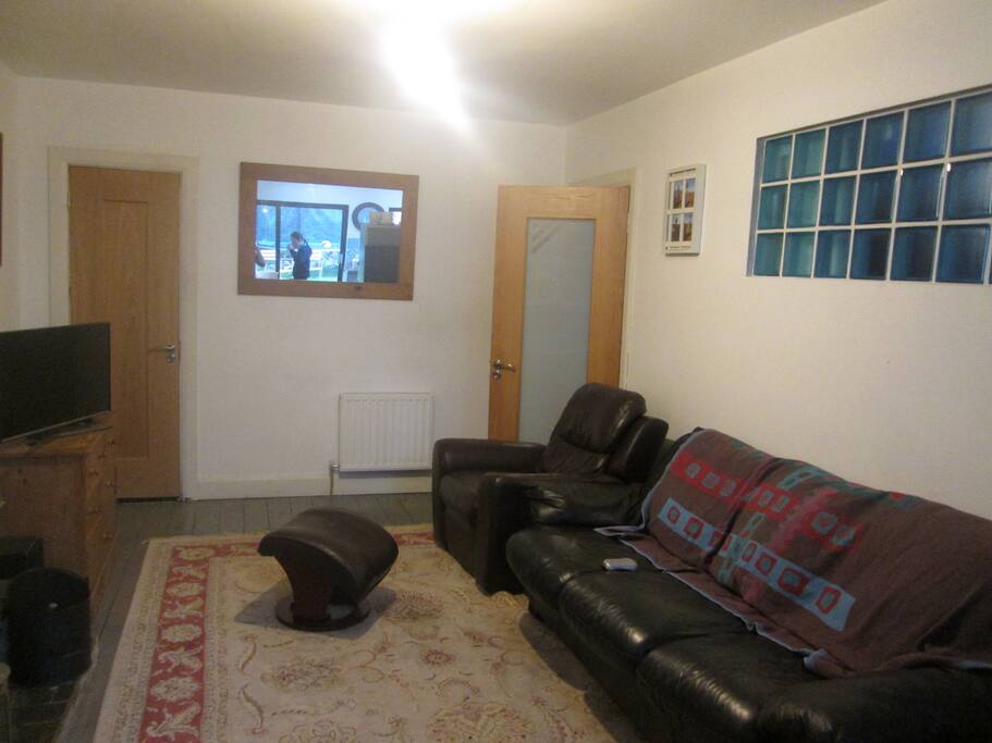 Cosy sitting room with fireplace