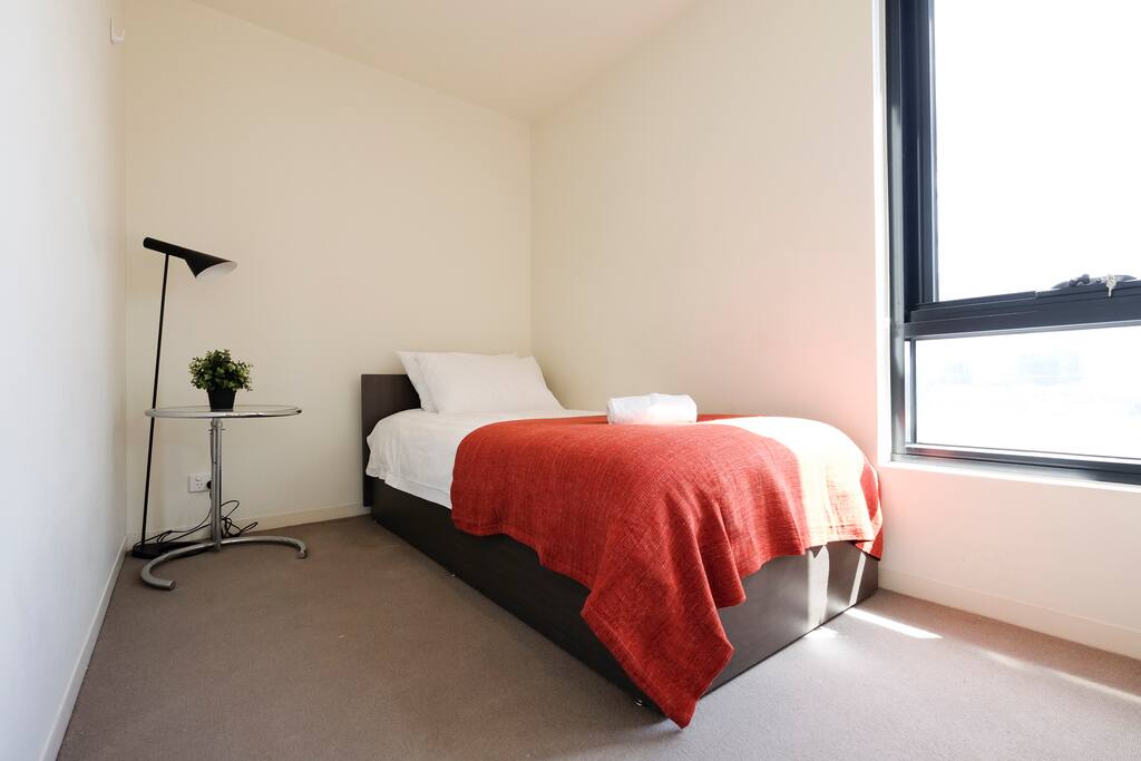 Single bedroom with perfect lighting.