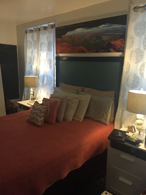 Beautifully decorated bedroom that has a Queen bed.