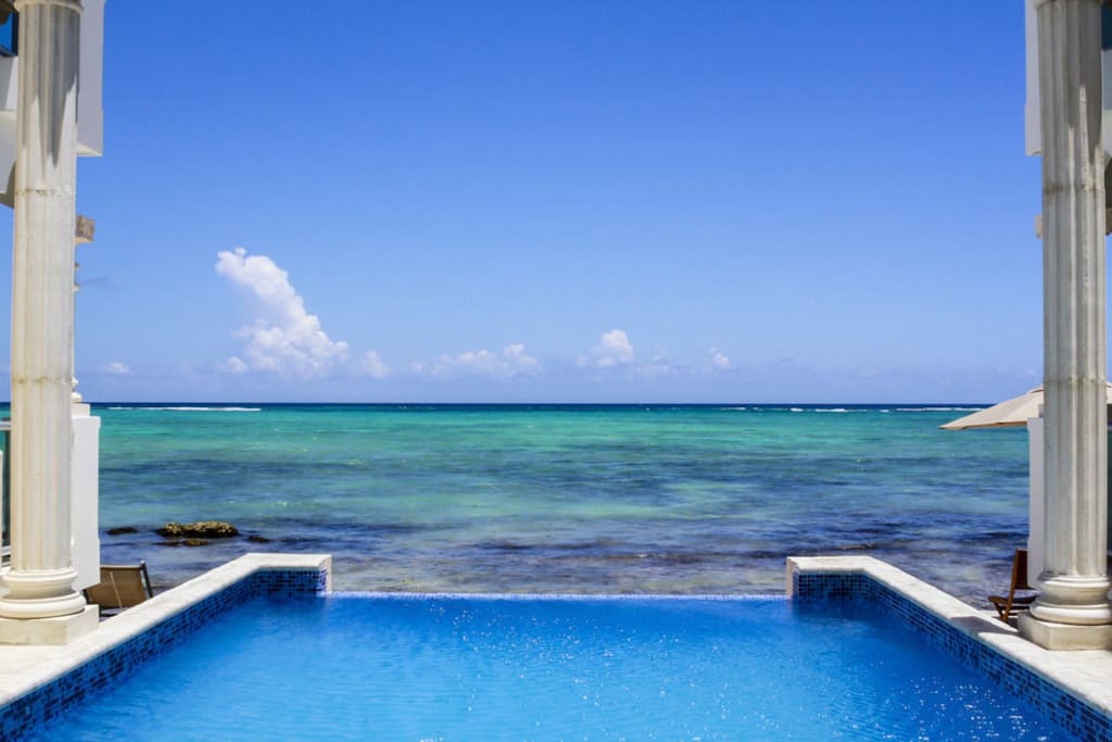 Our infinity pool next to the beach.