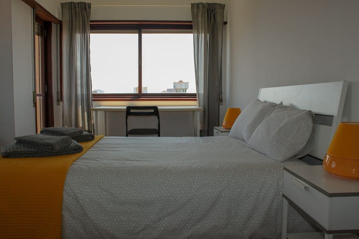Main room with double bed, small balcony, amazing view and sunlight