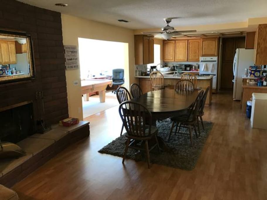 Open, airy kitchen and dining area with gas burning fireplace can be reserved for your guests.