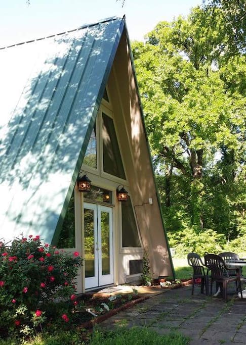 Private back porch with view of grounds.