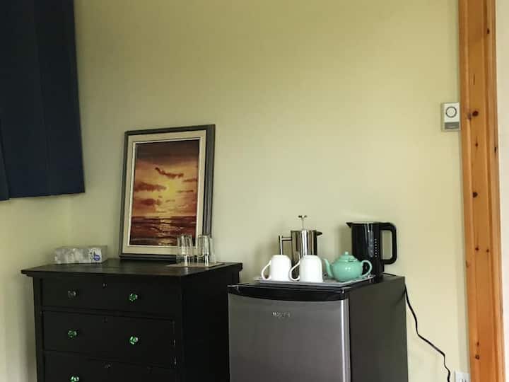 In Cape Breton, the tea pot is alway on.  In your room you can make tea, coffee or enjoy herbal tea as well. A French Press coffee pot is provided as well as a tea pot and an electric kettle. 