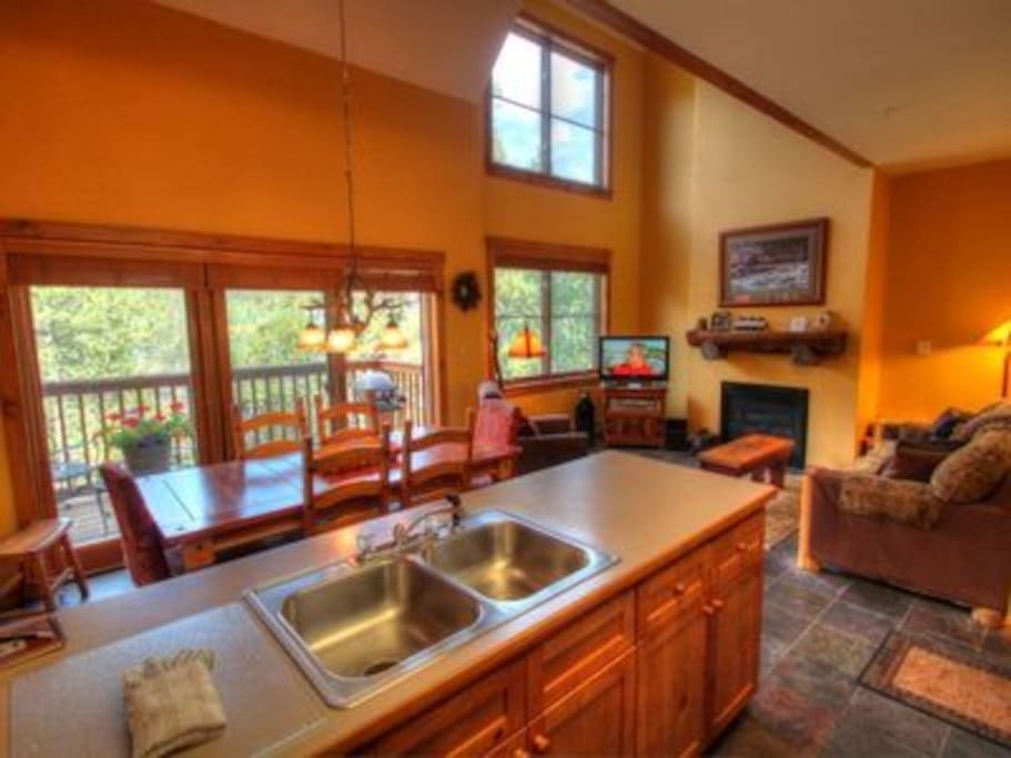 Kitchen looking into cozy living space.