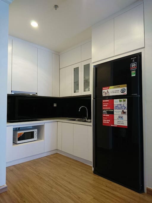 Here is the kitchen full equipped, modern frigo. We put tea/coffee/bread/noddle here for your breakfast.
