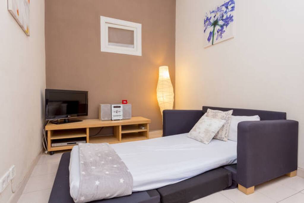 Sofá cama con colchón adicional