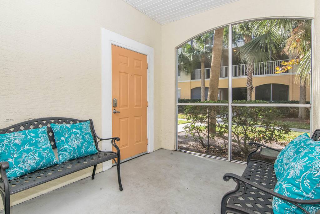 Entrance into screened patio before you enter unit