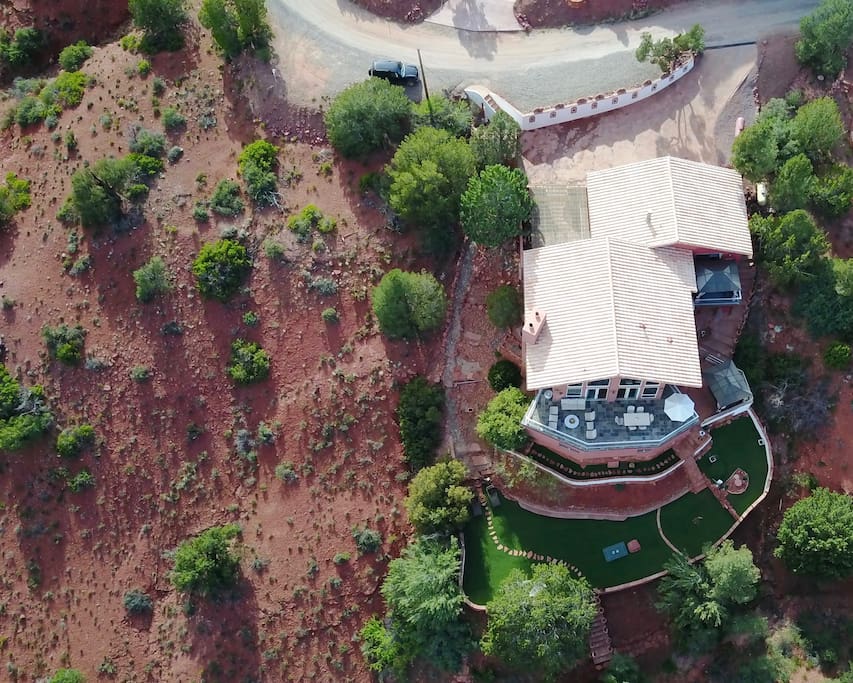 This is an ariel view of the property. Kokopelli studio lays to the back right hand side. If you look carefully you will see the cabana on the studio deck under the 2nd roof top