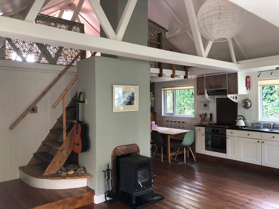 fire place and stairs to mezzanine