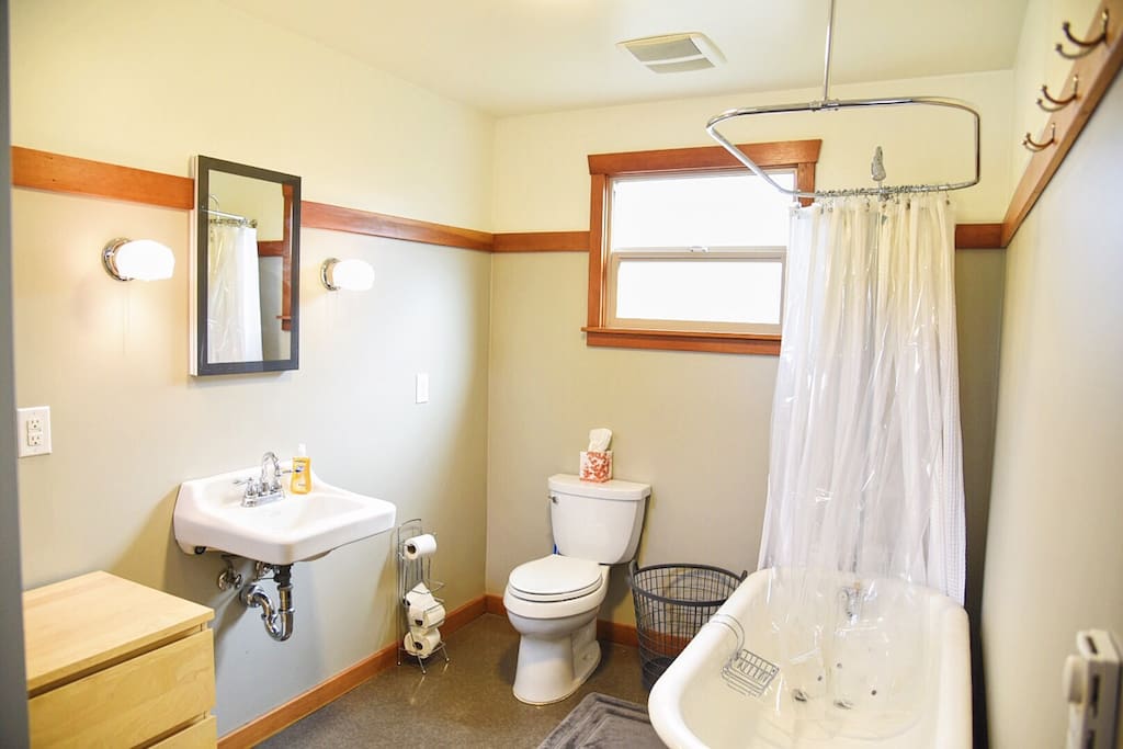 Claw foot bathtub and shower.