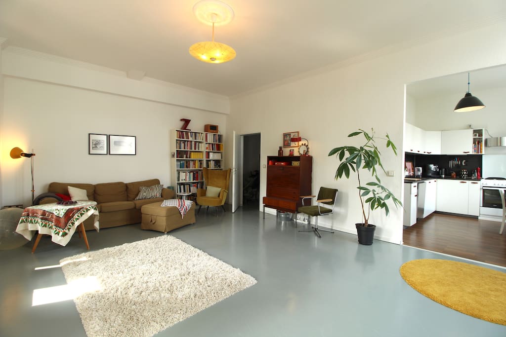 From the bright living room you can enter the kitchen.