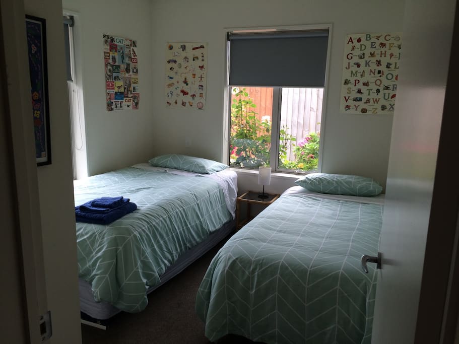 Second bedroom. One king single and one roll out bed.