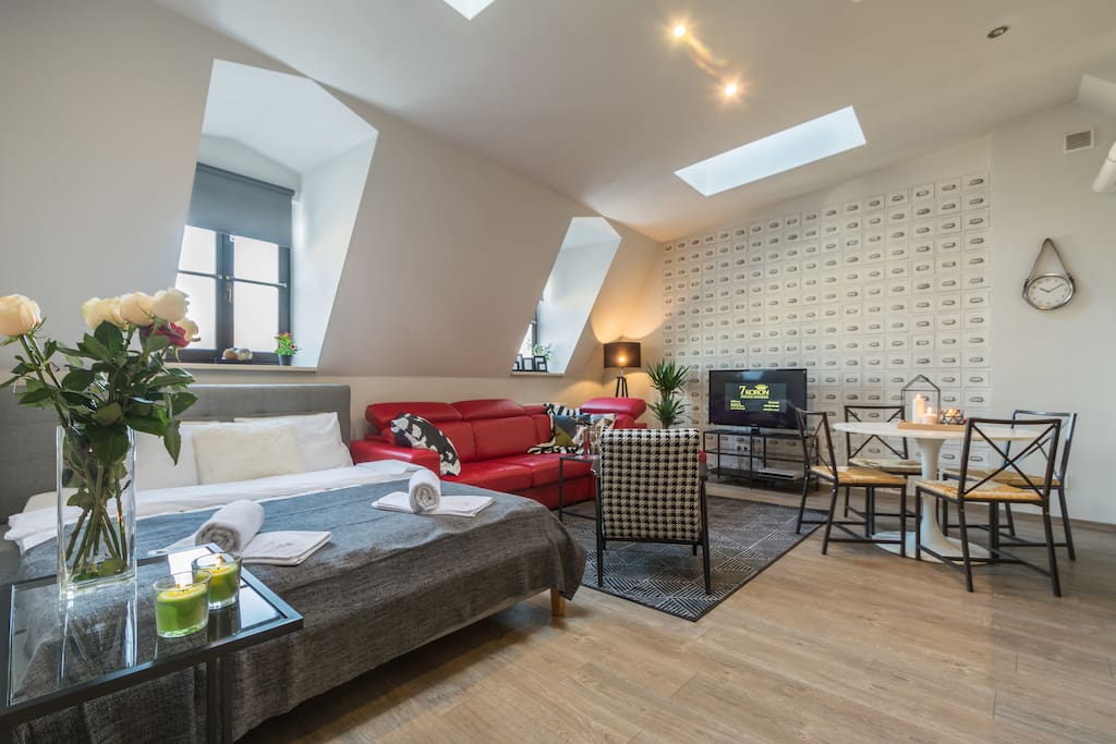 Double queen- size bed and expandable sofa.