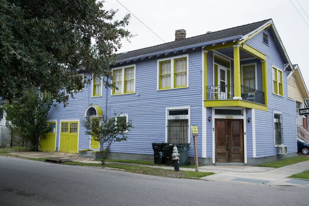Your colorful home! The bottom floor used to be a corner store. Your apartment is upstairs and you enter on the side.