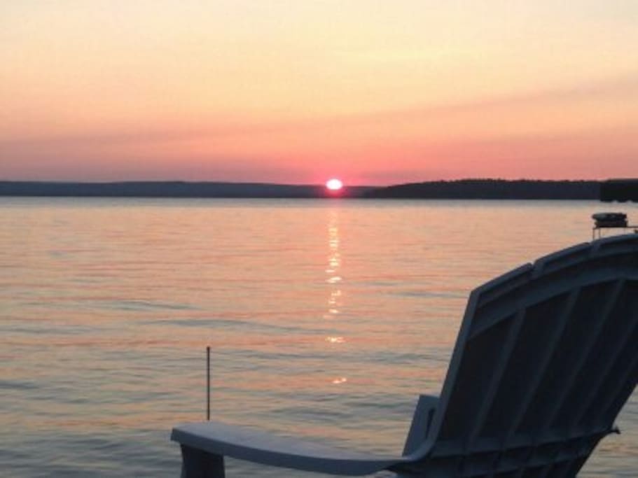 Sunset over Burt Lake from sundeck on dock