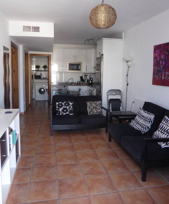 LOUNGE AREA with KITCHEN AREA in BACKGROUND
