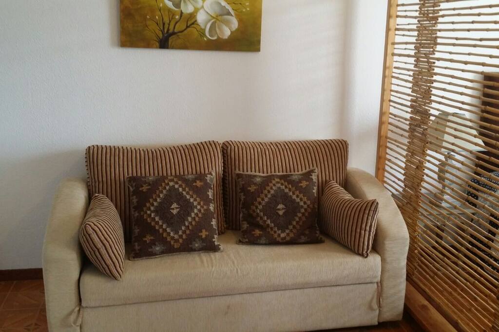 The sofa is a decent size and pretty comfy.