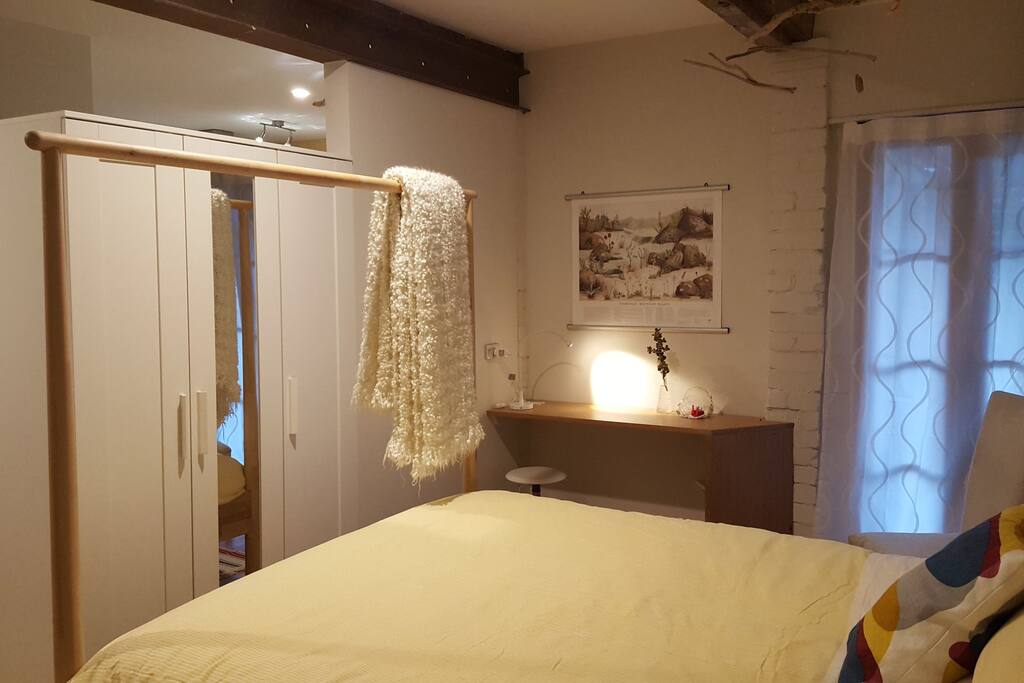 Bedroom 2 with wardrobe and laptop table. Space for a portacot for a baby or toddler.