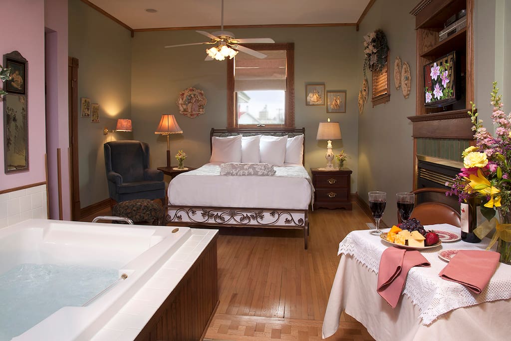 Bedroom Two - Queen Bed, Private Bath, Walk-in shower, Gas Fireplace, and Whirlpool tub. Coffee maker, refrigerator, microwave in room.
