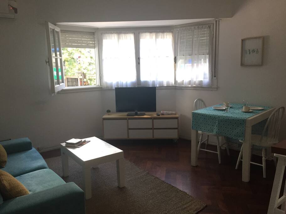 Luminous living room with cable tv and wifi. Large confortable couch.