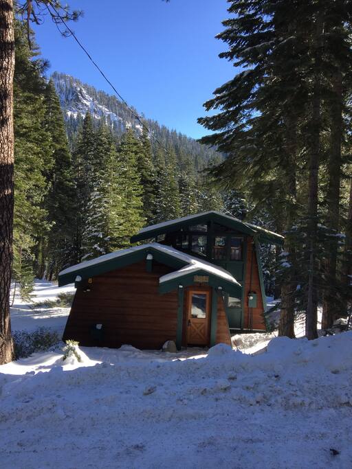 The cabin backs onto four undeveloped, and spectacular, acres. And has a little sledding hid right next door.