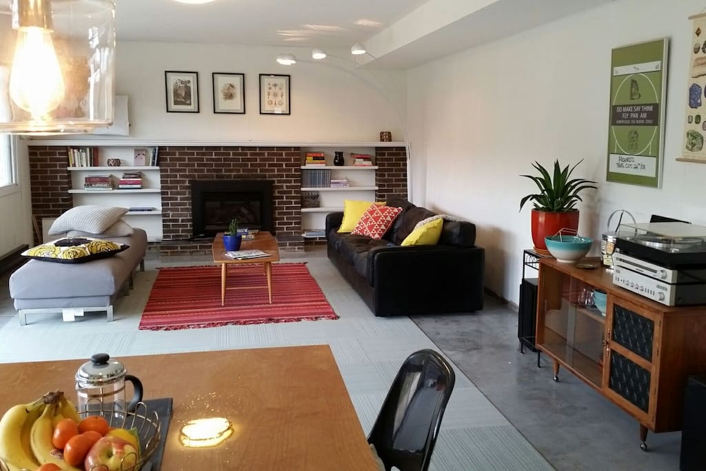 The living and dining area. There's a gas fireplace for cool winter nights and to the left is the patio for summer evenings.