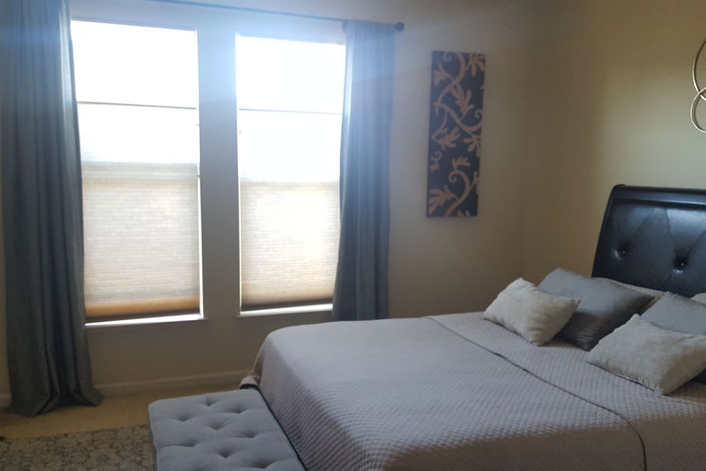 clean, spacious, well-lit bedroom