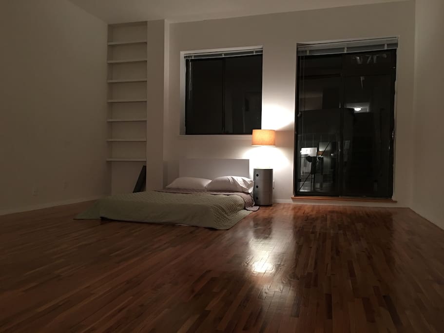 Open living room (currently with additional mattress, if needed to accommodate 3+ guests)