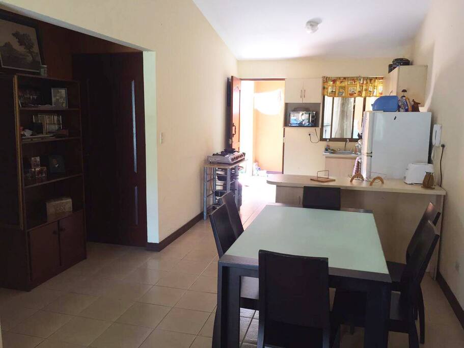 Dinner table and kitchen