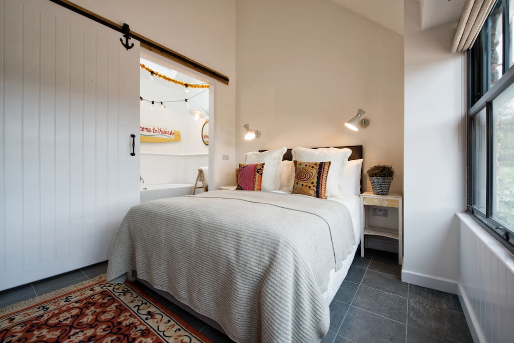 King size bed and bathroom
