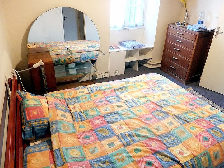 A large double bedroom on the first floor with En Suite facilities, a King Size bed with an electric under-blanket in the winter for your use if you like. This is my best bedroom, with plenty of room and a view out across the village and countryside.