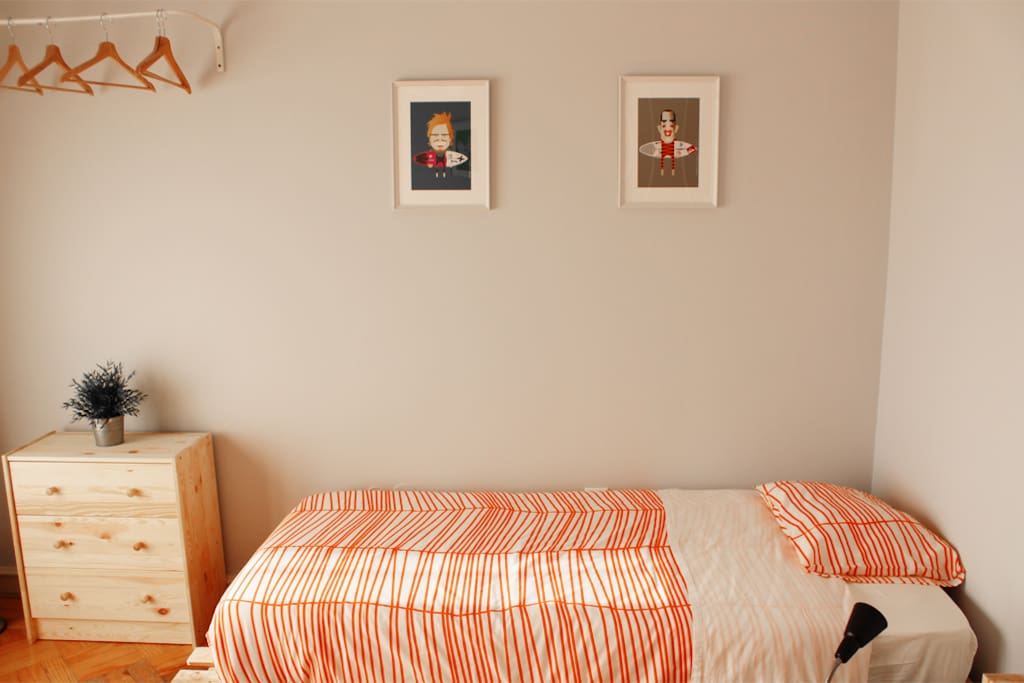 single bed in twin shared room with balcony with ocean view