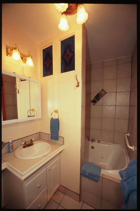 As in the Forest Room, the Garden Room bath includes a whirlpool tub for two with shower.