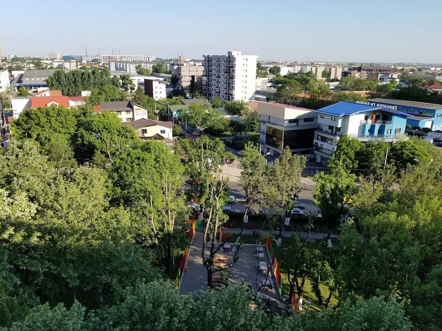 View of the children's playground and bus station across the street (EuroMaster Sign)