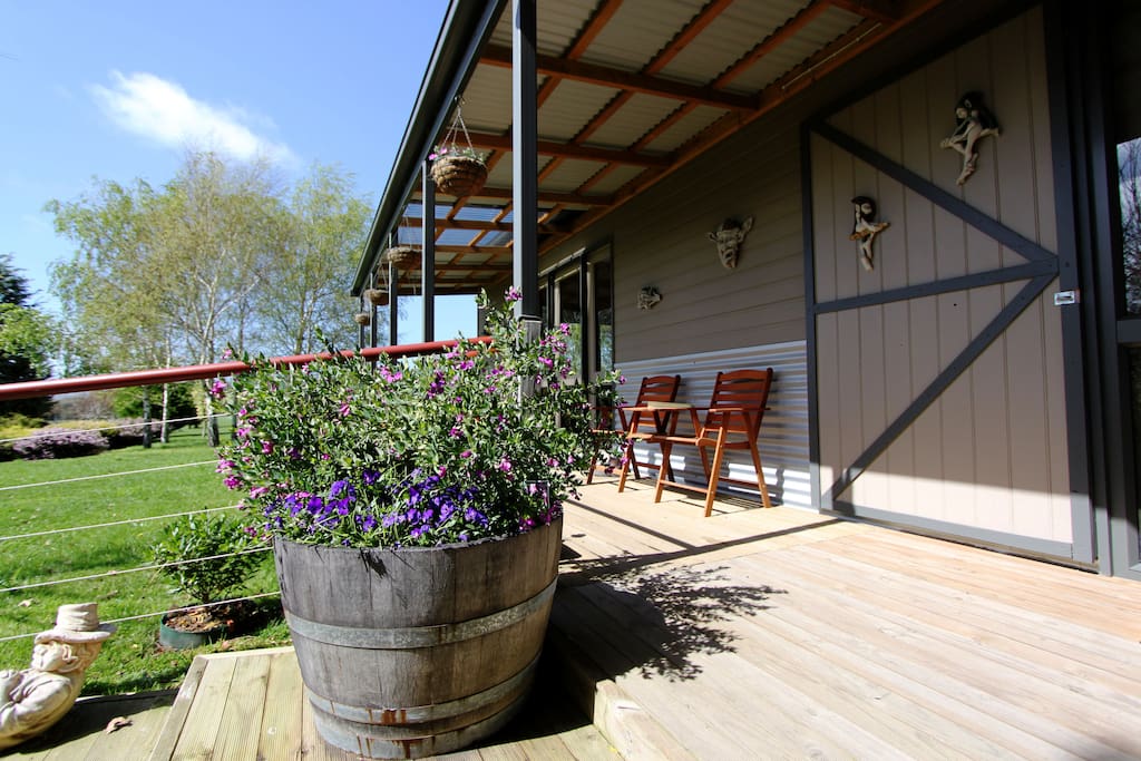 Front porch. Relax and read a book or a glass of wine