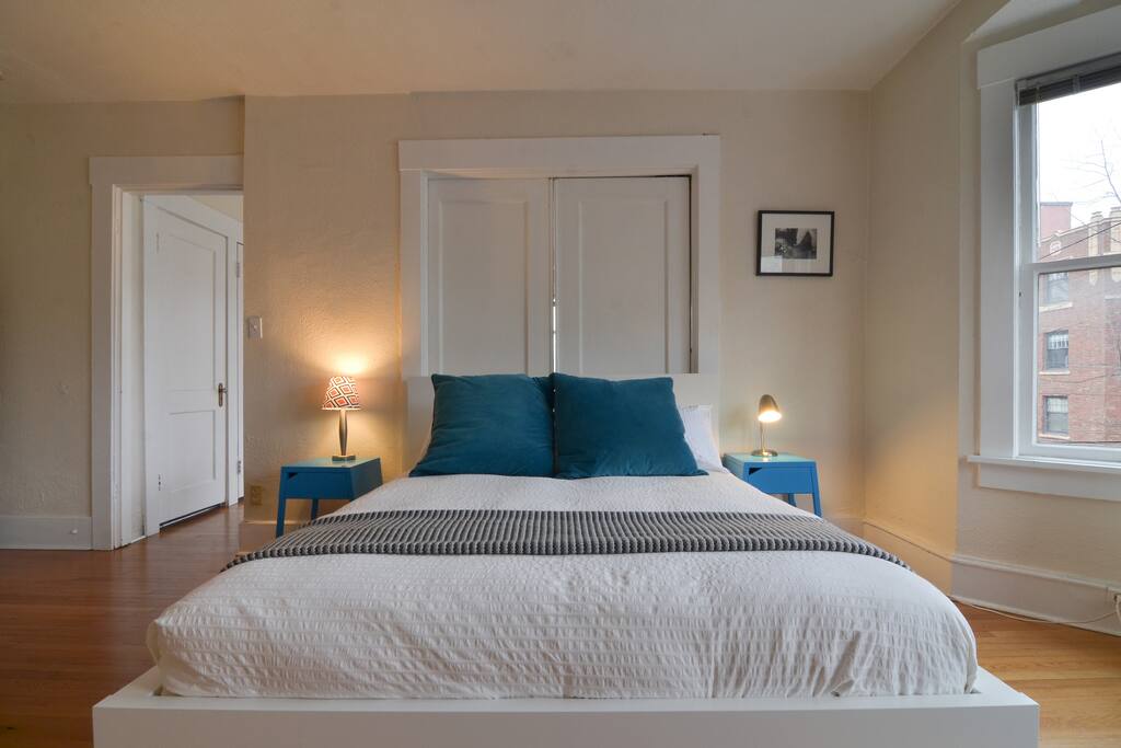 Comfy queen size bed waiting for you after long day of sightseeing
