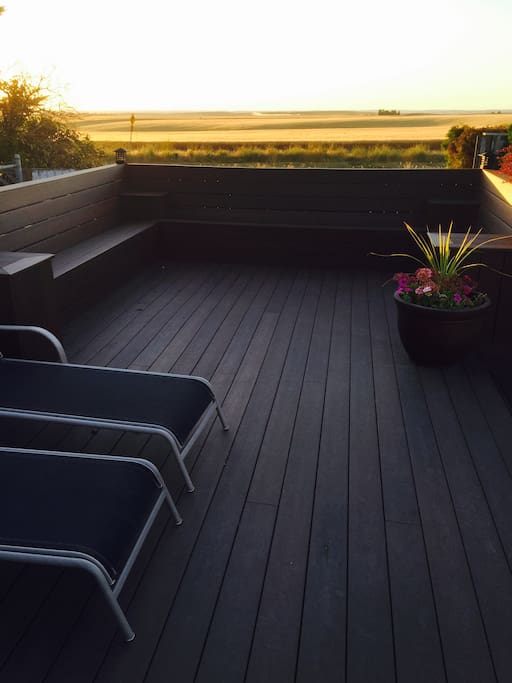 Large deck overlooking the wheat fields and sunsets