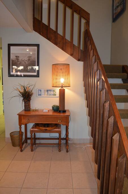 Entry way and stairs leading up to bedrooms