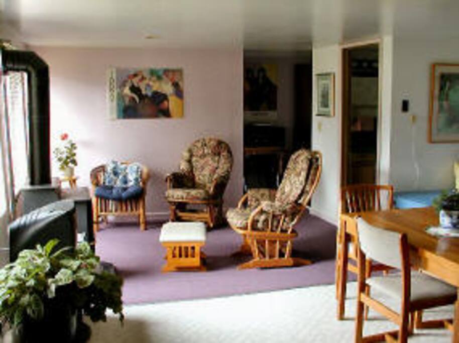 Ground Level Living room with gas light fire place