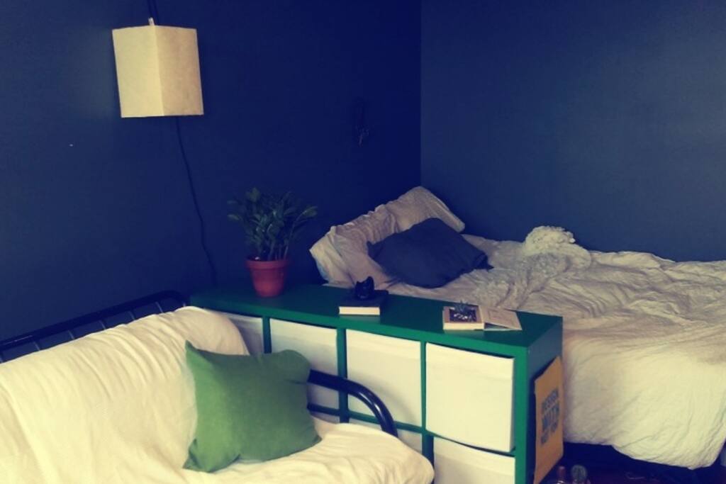 Bedroom with futon and separated sleeping area