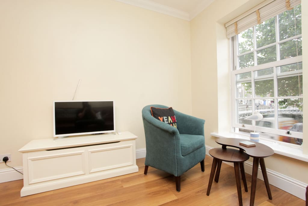 sit and watch the world go by overlooking the famous River Liffey
